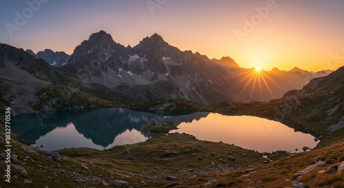 雄大な山々に夕日が沈み湖面を黄金色に染め上げる光景は息をのむ美しさだ 静寂な水面にきらめく太陽の眩い輝きと山々の影が鮮やかに映し出され見る者を魅了する絶景. AI Generated