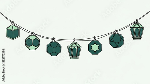 A string of geometric lanterns and polyhedra in teal and light green suspended on a wire against a pale background