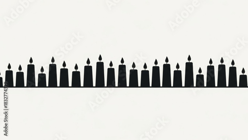A horizontal line of black silhouette candles with flickering flames stands against a plain white background creating a festive or memorial atmosphere