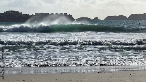 Paguera beach with strong wind , high Waves and Surfer, Calvia, Mallorca, Spain