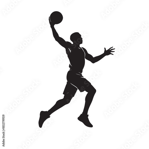 Silhouette of basketball player dunking with ball jumping