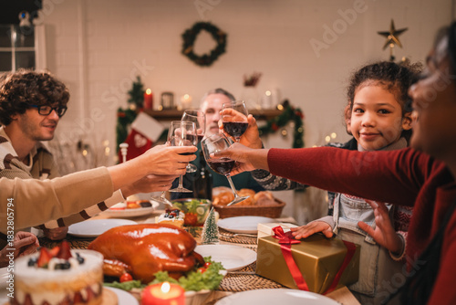 Joyful holiday gathering with friends sharing festive cookies, enjoying roast turkey, and sipping red wine in a warm atmosphere filled with laughter, desserts, and seasonal decorations