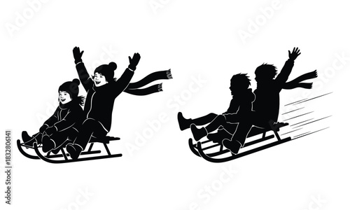 Silhouette of family tobogganing