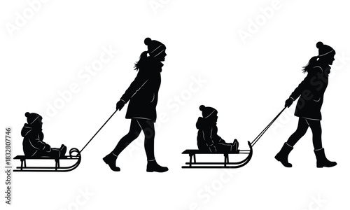 Family tobogganing silhouette