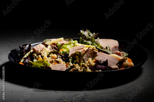 Bowl of salad with tuna steak