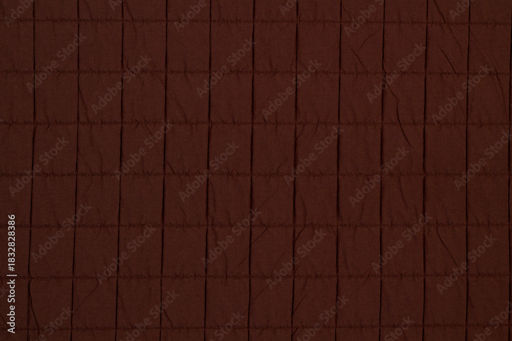 Naklejka premium Quilted fabric. The texture of the blanket. Background to your project