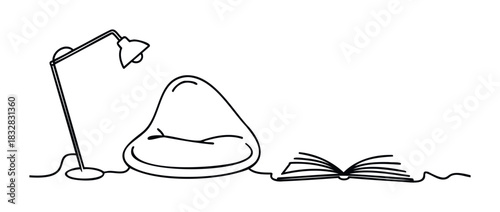 Cozy reading nook with lamp and bean bag chair inviting relaxation and study for a comfortable home or office space perfect for a quiet escape.