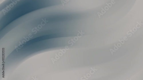 Soft gray and deep blue colors blend in smooth swirling waves. This abstract animation features fluid motion and a gentle lighting style