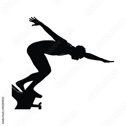 Swimmer poised on starting block ready to dive into water silhouette