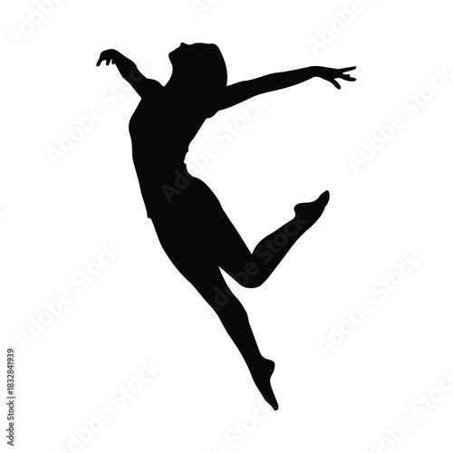 Dynamic silhouette of a female dancer in mid air leap silhouette