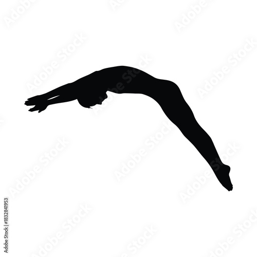 Graceful diver in mid air performing a somersault silhouette