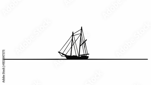 Silhouette of a majestic sailing ship on the open sea.