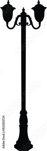Black silhouette of a classic double lamp post