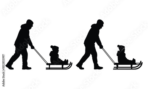 Family sledding silhouette