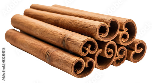 Pile of cinnamon sticks against black background