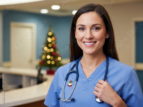 Smiling nurse with stethoscope and Christmas tree in the background