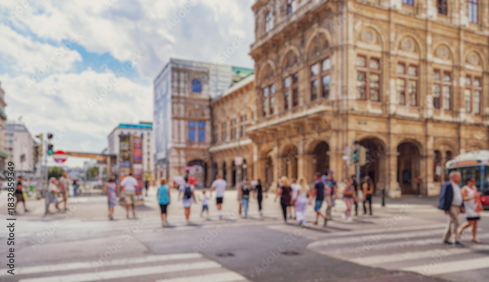 Obraz premium Crowd of anonymous people walking on busy city street