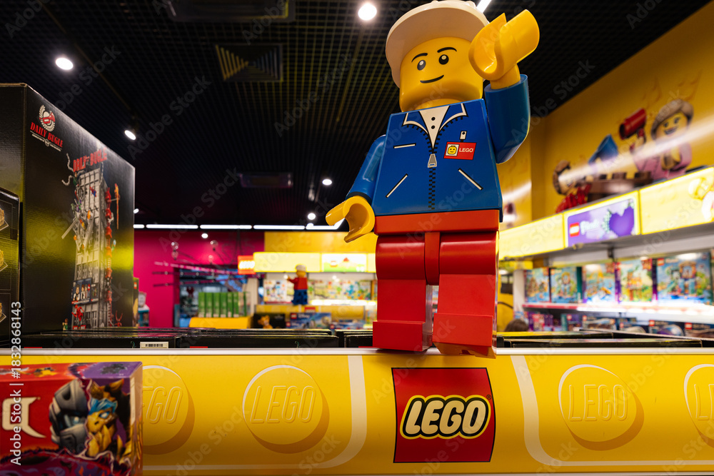 Naklejka premium Large Lego minifigure statue in toy store