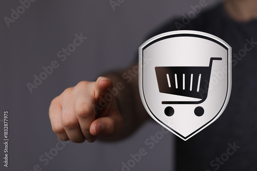 A person pointing to a shop...