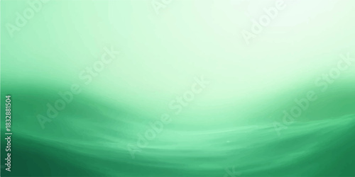 Abstract green background with soft waves of colour and light illustrating a blurred motion design pattern as a bright backdrop concept