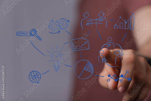 Hand pointing at digital bu...
