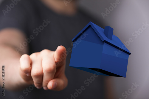 A hand pointing towards a b...