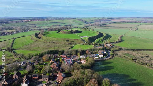 Aerial shot flying towards the ancient fort of Old Sarum, Salisbury, Wiltshire