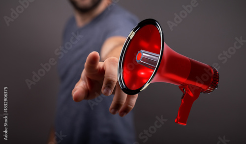 A man's hand pointing at a ...