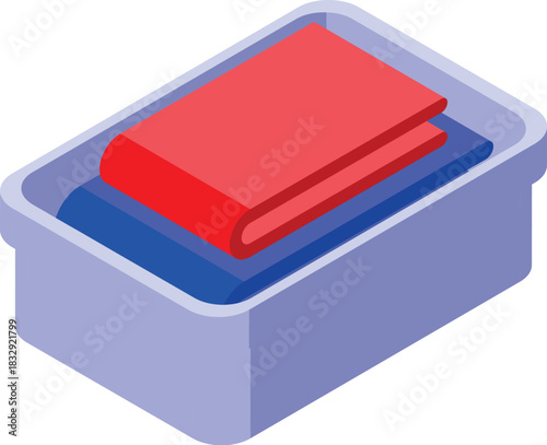 Folded clothes are neatly placed inside a plastic container, ready for laundry or organized storage