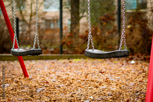 Two Lonely Swings in a Quiet Autumn Park
