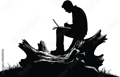 Silhouette of Man Working on Notebook Sitting on Old Tree Stump in Nature