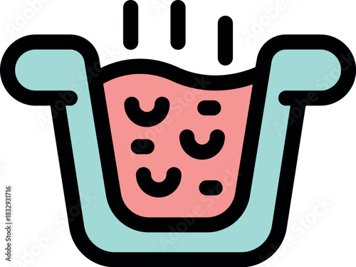 Steaming water is filling a foot bath, offering a soothing and therapeutic experience for relaxation