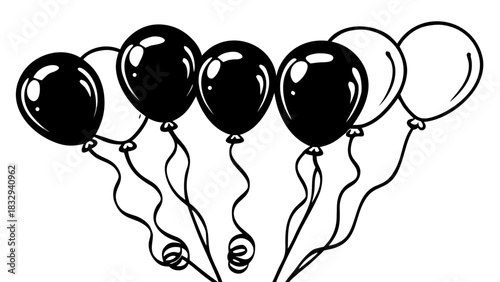 A bunch of black and white balloons are floating