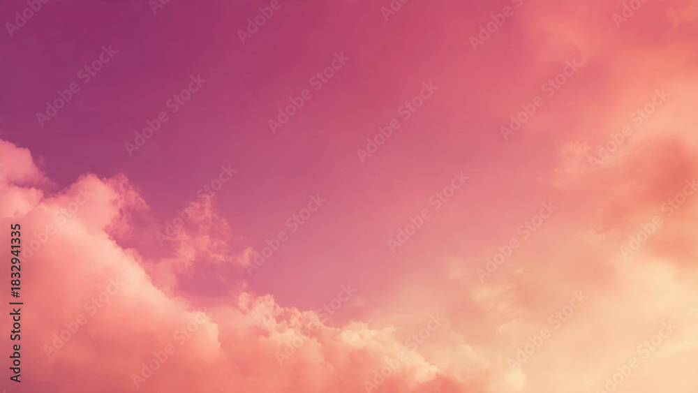 Obraz premium A breathtaking sky displaying an ethereal gradient of soft pink, rich magenta, and warm peach clouds, creating a serene and colorful atmosphere.