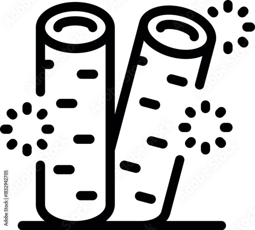 Fresh wasabi roots are prepared, with sparks flying around, ready to be grated into a spicy paste