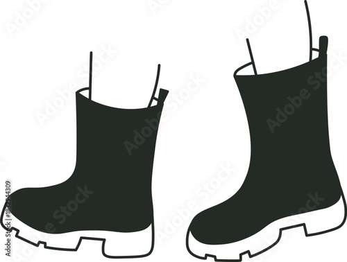 Pair of robust rubber boots preparing for outdoor activities