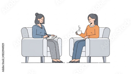 Two women sitting in armchairs facing each other one with a cup and the other with a notepad and pen