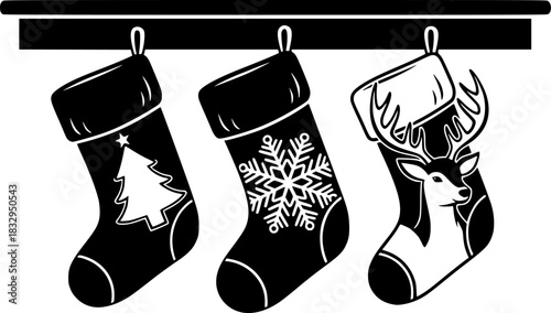 Four black and white Christmas stockings with a white background.
