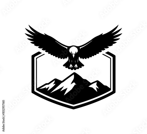 Majestic eagle soars above mountain peaks, symbol of strength and freedom