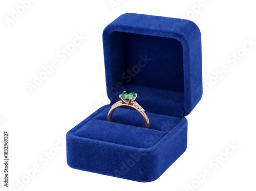 Elegant gold ring with green gemstone in blue velvet box isolated on transparent background, jewelry gift for engagement and special occasions PNG