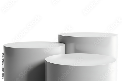 Three white cylindrical pedestals of varying heights arranged closely together isolated on transparent background