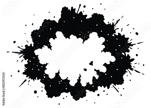 Abstract black ink blot with white center, splatters and drips on a white background design
