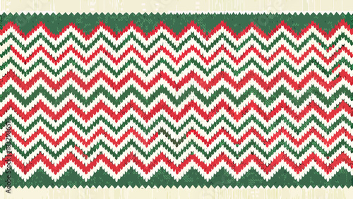 Festive red and green zigzag pattern border with decorative edge