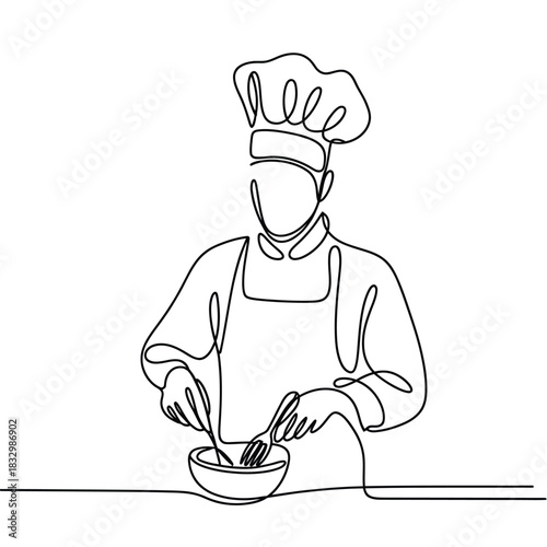 Chef in toque and apron preparing food with whisk and bowl