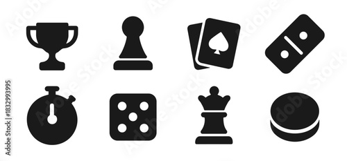 Games icon collection in black featuring trophy, pawn, cards, domino, stopwatch, dice, chess queen, and hockey puck