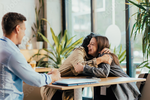 College Friends Meet and Hug at University Cafeteria During Lunch Break