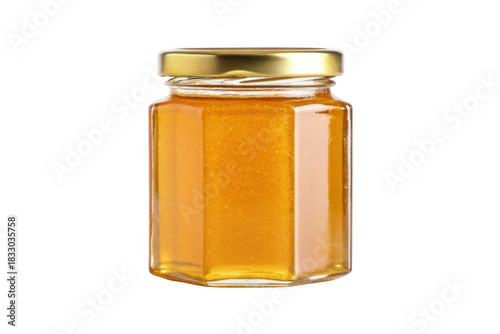 Hexagonal glass jar filled with golden honey isolated on transparent background