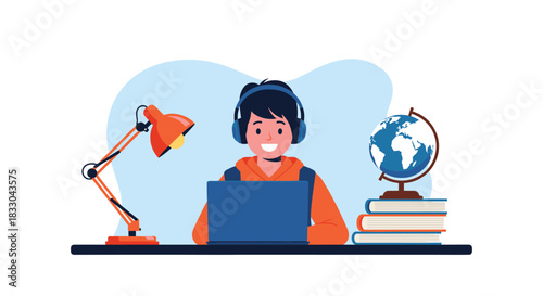 Happy boy with headphones studying online using a laptop at his desk, with a lamp, books, and a globe in his room.