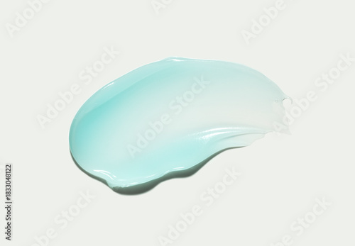 Beauty product sample swatch of blue gel moisturizer or serum on light background