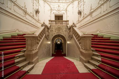 Bilde på lerret Grand ornate double staircase with red carpet in a historic Budapest palace inte